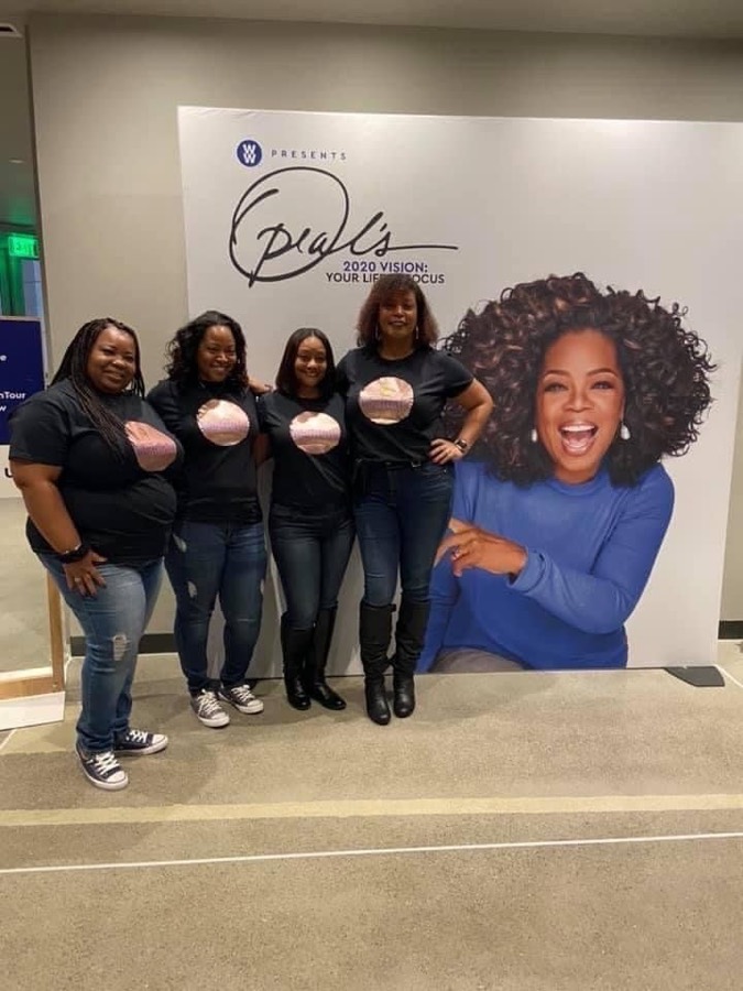 Qiana and Wholelistic members at an Oprah event